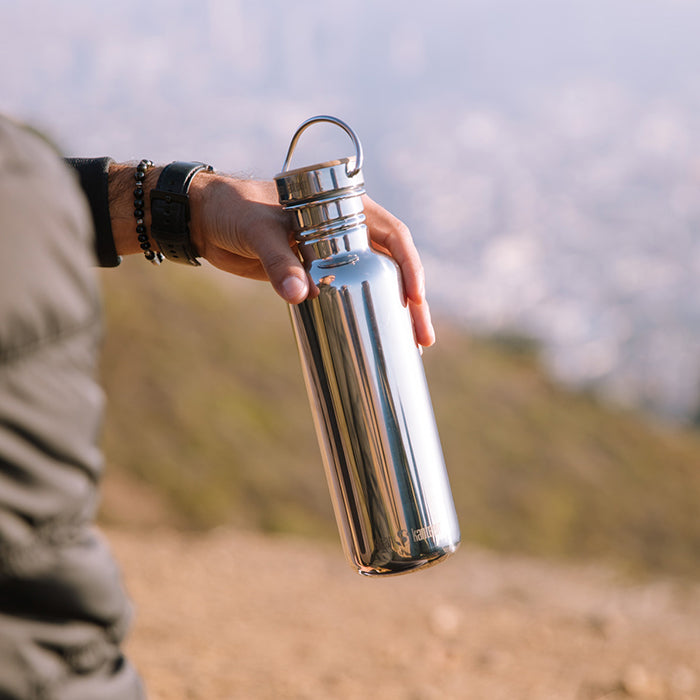 27oz-reflect-with-bamboo-cap-p7 K27SSLRF-MS-BAMBOO_reflect_bottle_hand_lifestyle.jpg