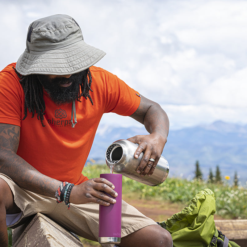64oz-tkwide-with-loop-cap-l9 tkwide_64oz_bottle_backpacker_mountains_filling_square.jpg