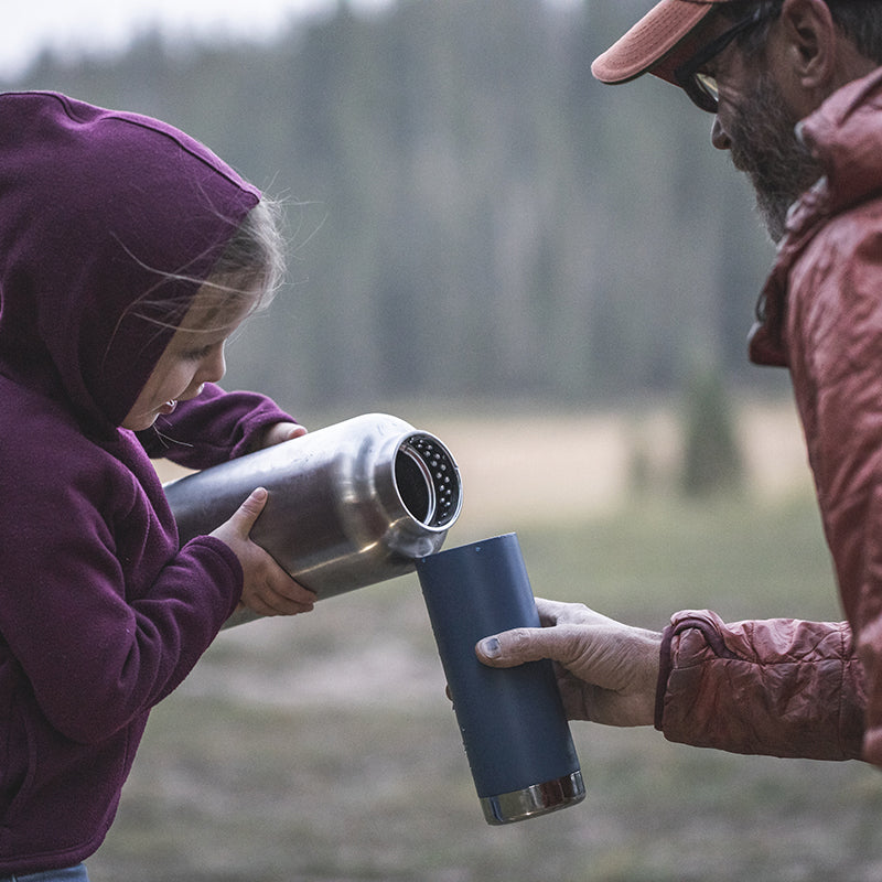 64oz-tkwide-with-loop-cap-l9 tkwide_64oz_bottle_girl_dad_filling_square.jpg